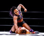 Ayesha Raymond beating down her defenseless opponent from ayesha takia hott