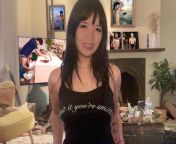 Asian Girl Posing with Her Erotica in the Background from asian girl masturbate with spermy panty