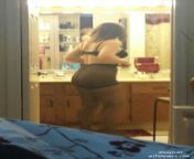 Candid voyeur milf getting ready in the bathroom. from tiny candid