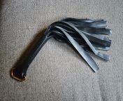 Rubber Flogger made from a bicycle inner tube cut into strips and wrapped in a piece of the tube for a handle from nonk tube