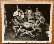 Found this picture of my great-grandfather and a few of his german division members. The description on the back is The first wine in France, so I assume it was taken during the western campaign. from russian grandfather and granddaughter