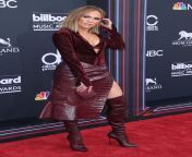 Speaking of Jennifer Lopez, she poses well in burgundy leather skirt and boots, she gets me hard at the thought of me bowing down to her boots from fucked hard jennifer lopez jpg