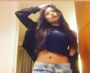 Twinkle Meena navel in navy blue t-shirt and blue jeans from meena navel nude