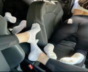 3 woman in car in are white socks from romance in car in indonesia
