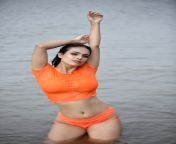 Neha Malik shared a bunch of new orange hot &amp; sexy bikini photos from neha malik mujra sexy