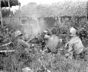 U.S. Army soldiers of the 5307th Composite Unit &#34;Merrill Marauders&#34; fires an M1917A1 Browning machine gun at Japanese forces about 100 yards away during the Battle of Myitkyina in Burma (July 1944) from burma grl