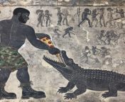 Sumerian Sanskrit cave engraving, a large black man with Camo shorts and army boots feeds a pizza slice to an alligator, faded colour, many etching from india grill with black man