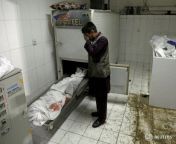 An Afghan man cries next to his daughter&#39;s body after a blast, at a hospital in Kabul, 5/8/21 from kabul age