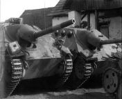 Date: Monday, 7 May 1945 Place: Černá v Pošumaví, Český Krumlov District, South Bohemian Region, Czechoslovakia Photographer: US Army photographer 7 May 1945. The war is over for these Jagdpanzer 38s. This image was shot by a US Army cameraman attached to from 香港二四六开奖结果大全网址👉【1945 cc】49tb