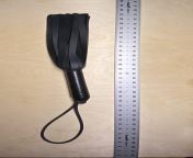 I built a u/vonlaserface silicone flogger, sporting twelve (12) inch long, 1/2 inch wide, rounded tip falls. Handle is 5/8 od steel tube wrapped in silicone under 2 inch vinyl tape, with 1/4 inch biothane rope for the lead. Rope is retained by knot within from 14 inch long land black sex