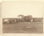 Lakota Sioux in Pine Ridge, SD 1881 (A native reservation) camped near the Indian school so they could be closer to their children who were taken. from indian school girl and