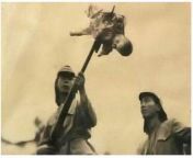 Japanese Soldier plays with baby impaled by his bayonet. Not enough attention gets brought up of the atrocious acts during the Rape of Nanking from xxx raping japanese school rape of young