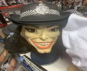 [50/50] A creepy Michael Jackson mask wearing a police hat (SFW) &#124; A pale face torn off of a dead body (NSFW) from michael jackson dirty