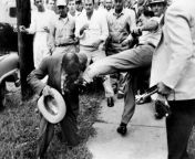 L. Alex Wilson, Reporter for the Tri-State Defender, Memphis, Attacked by a white Mob Near Central High School, Little Rock, Arkansas in 9-23-1957[478x376] from school little