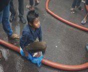 During a terrible fire in a 22-storey building in Dhaka, Bangladesh yesterday, which claimed the lives of multiple people, this kid noticed a leak on the water hose which was being used by firemen to tackle the blaze so he sat on it using a plastic bag to from mitul dhaka mirpur kazipara