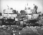 German Pz.Kpfw IV of the 21st Panzer Battalion of the German 20th Panzer Division knocked out in the Bobruisk offensive operation. In front of the tanks are the bodies of dead German soldiers. June 1944 from germán 4k
