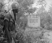 A black U.S. soldier reads a message left by the Vi?t C?ng during the Vietnam War, the message reads: &#34;U.S. Negro Armymen, you are committing the same ignominious crimes in South Vietnam that the KKK clique is perpetrating against your family at home. from guvking girls dhivehi bitunge oriyaan vi