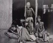 A man guards his family against cannibals. Madras famine 1877 in India, during the British Raj. from ritu raj photo