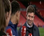 Gerrard smiling at Jude. ( basically a confirmation of the deal and him approving wearing the #8) from steven gerrard