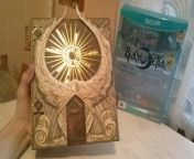 In Europe, we got the First Print Edition of Bayonetta 2 which came with physical copies of both games and this cool box shaped like the Hierarchy of Laguna. from best of karisma kopur and gobinda juke box