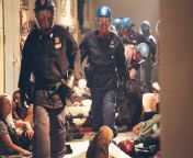On this day in 2001, Italian police raided a school occupied by anti-globalization protesters and journalists, beating and torturing hundreds of protesters. No officer served time in prison. from xxx anti mob no and