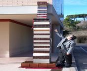 Italian man sets World Record by &#39;Mirror/Backwards typing&#39; 81 books in ancient languages using 4 completely blank keyboards simultaneously. Across all 81 books, he has typed 4,593,552 words in total. Altogether, the books weigh 1,236 kg (2,724 lb) from world record lisa sparxx show 50 m