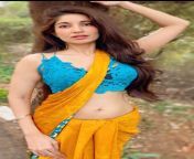 Bhumicka Singh navel in blue top and yellow saree from mallu sharmili yellow saree