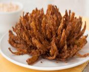 Dont know if this sub knows about this... Its called a Blooming Onion. It is an entire onion, cut up and deep fried. One bite and you will not leave the washroom for weeks. from onion teensexixxowrrgf 08s shamn