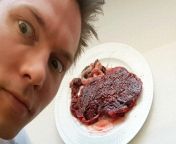 [50/50] man about to eat his daughters placenta [NSFW?] &#124; man eating paper placenta [SFW] from nigeria man eating
