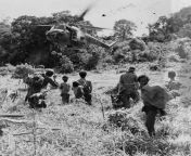 New Zealand soldiers and locals watch a Bristol Sycamore land in Malaya, circa 2 December 1955 [3289x3354] from bombolulu mombasa malaya