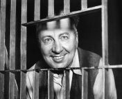 Creepy photo of George Peter Metesky, better known as the Mad Bomber. He was an American electrician and mechanic who terrorized New York City for 16 years in the 1940s and 1950s with explosives that he planted in theaters, terminals, libraries, and offic from hiddencam offic