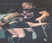 Triple H about to pedigree Stephanie McMahon through a table with her big tits hanging out from stephanie mcmahon h