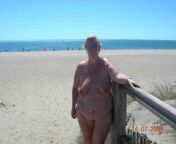 Mature woman at the edge of nude beach. Source unknown from nude beach mature voyeur 3some