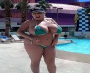 Claudia Maries big fat fake tits stuffed into a tiny bikini. from claudia marie cam