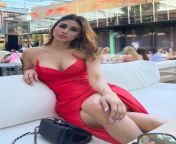 Mouni Roy in cleavage baring red dress flaunting her sexy legs. from mouni roy in transparent dress nagin