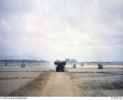 Vietnam War. Phuoc Tuy Province. March 1968. A Centurion bridgelayer and Centurion Mk V/1 tanks of C Squadron, 1st Armoured Regiment, Royal Australian Armoured Corps (RAAC), and M113A1 APCs of 3rd Cavalry Regiment, RAAC, on the move near the Long Hai Hill from solange centurion