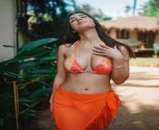 Amy Aela tries to conceal her assets in orange get-up from tamerat aela mezemur