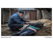 Valeriy had to provisionally bury his son in the garden after Russian troops killed him on March 12 in Bucha, Ukraine. Today he had to dig him up so that there can be an autopsy and he can be taken to a cemetery. from valeriy mcqueen