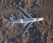 Space shuttle Endeavour atop its Boeing 747, flying over Mojave desert to NASA Kennedy Space Center in December 2008. from pal mojave