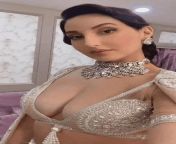 Nora fatehi ? look at her massive milk jugs guys ? i want those melons man ? she have the biggest melons in Bollywood agreed or not ? ??? from boobs pressing in bollywood