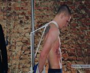 Russian wrestler tied to the pole by rope for abs and chest flogging. A pic from RusCapturedBoys.com video Captured Sambo Fighter - Part I. from sex mam and baby 80w com video san 18 bangla chat mom