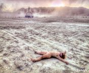 &#34;Martian Sacrifice&#34;. This was the last photo I took of Dee chained to the playa at Burning Man 2004. A dust storm arose from the northwest, and you can see the clouds rushing to engulf her. from 2004 a