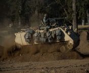 U.S. Army Reserve combat engineer Soldiers from the 374th Engineer Company, of Concord, California, ride through a berm in an M113 Armored Personnel Carrier on a combined arms breach during a Combat Support Training Exercise (CSTX) at Fort Hunter Liggett, from combat bugil