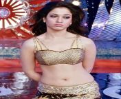 Tamanna navel in gold blouse and skirt from www tamanna navel video com