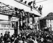 Benito Mussolini and his mistress Claretta Petacci hung by their feet in Piazzale Loreto in Milan. Mussolini was captured on 27 April 1945, few days after the liberation of Italy, while trying to cross the border into Switzerland, and executed the day aft from marsha milan bogel