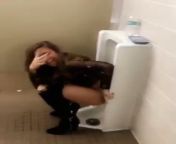 This woman pissing on a men&#39;s urinal while happily smiling for the camera from woman pissing mouth xx