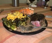 [homemade] cast iron butter fried filet mignon, Dijon mustard cream sauce, 3/4lb bbq lobster tail, Mac and cheese, and roasted brussel sprouts. from mignon ep 12