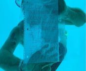 This guy swam to his girlfriend who was inside their underwater hotel room while on vacation in Tanzania, and proposed to her with a note and a ring seen here... He died before he could resurface from the water in this picture. from gays tanzania