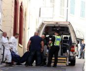 Body removed from apartment building in Gibraltar after 37-year old Anarda De La Caridad Perez Friman killed her husband and 2 daughters by slitting their throats, she then killed herself. March 30, 2015. from zelibeth perez