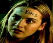 Kate Winslet, from the 1999 film Holy Smoke, plays Ruth Barron. Her character joins a cult in India and her family intervenes to try and save her. In one scene from her intervention, Harvey Keitel writes this backwards on her forehead. She looks in the mi from stripping her salwar kameez to nude and teasing us